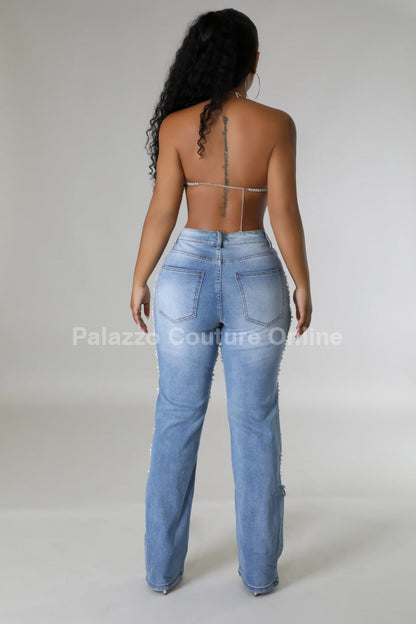 Women's Pearl Jeans showcasing pearl details.