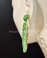 Nature-inspired statement earrings in vibrant green