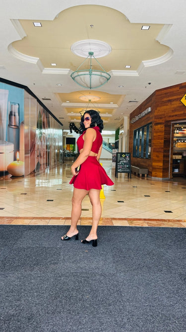 Eleganza Cut-Out Mini Dress- Burgundy side view highlighting short hemline