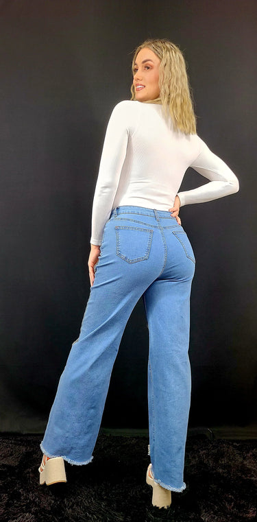 white long sleeve bodysuit detail
