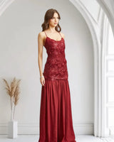 Enchanted Rosette Burgundy Sequin Gown with Chiffon Skirt side view highlighting floor-length hemline