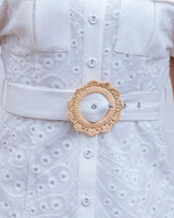 Eyelet Belted Mini Dress - Chic & Stylish Look side view highlighting short hemline