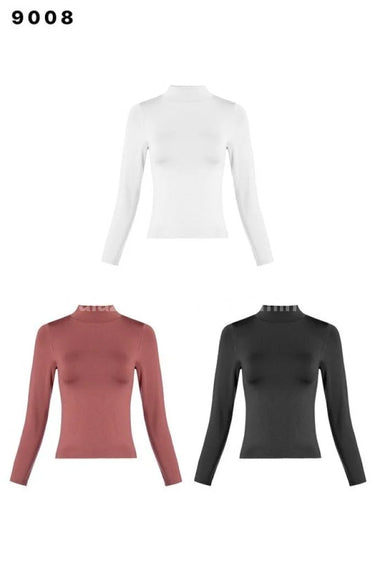 white long sleeve top styled on model