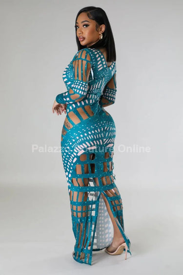 Feel Me Green Maxi Dress with Cutout Details side view highlighting floor-length hemline