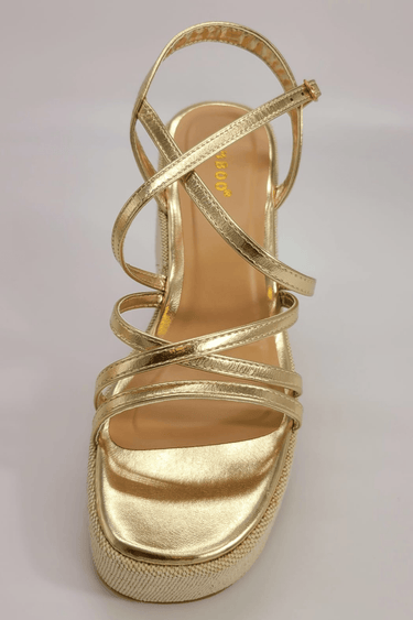 Gold wedge sandals with ankle strap and platform heel