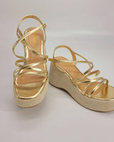 Elegant strappy gold sandals with cushioned sole