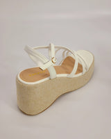 Side view of White wedge sandals with 3.5-inch heel