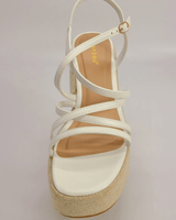 White wedge sandals with ankle strap and platform heel