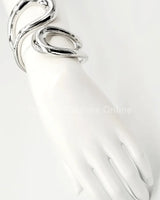 Gemini Wide Hinged Silver Cuff Bangle with Sculptural Design - trendy women's jewelry