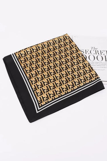 geometric monogram silk scarf in black with neutral tones