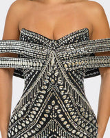 Side profile of black rhinestone bodycon mini dress