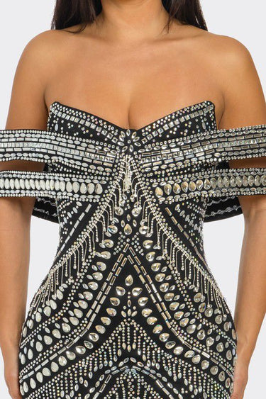 Side profile of black rhinestone bodycon mini dress