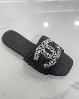 Elegant black slides featuring wide front band