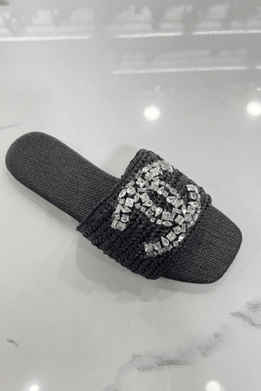 Elegant black slides featuring wide front band
