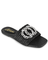 Black slides with tweed fabric and gemstone brooch
