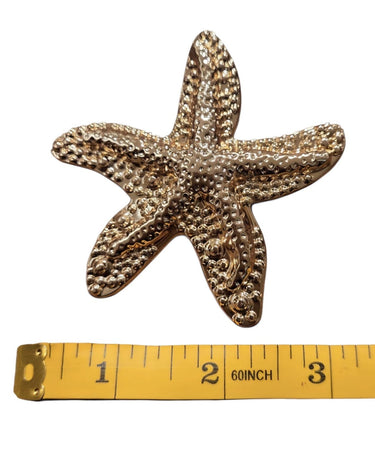 Gold starfish lapel brooch with textured finish – marine motif jewellery gift