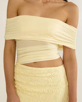 Golden Illusion Off-Shoulder Maxi Dress - Butter side view highlighting floor-length hemline