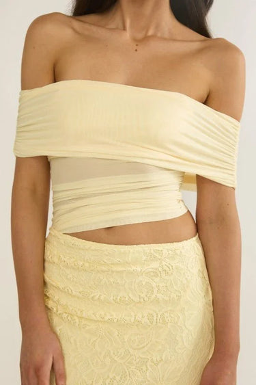 Golden Illusion Off-Shoulder Maxi Dress - Butter side view highlighting floor-length hemline