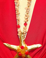 Golden starfish pendant necklace in pink gold with gemstone drop detail for women