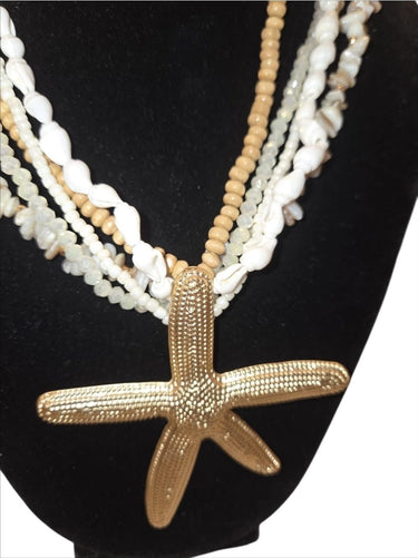 Beach style layered necklace in white gold featuring starfish pendant – resort‑wear jewelry