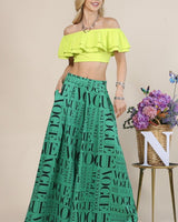 Graphic Palazzo Pants in green with bold black typography print