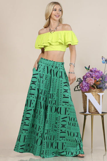 Graphic Palazzo Pants in green with bold black typography print