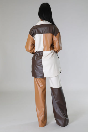 Wide leg faux leather cargo pants laid flat – high waist and utility style