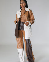 Back view of wide leg faux leather cargo pants – cargo pockets and straight leg silhouette