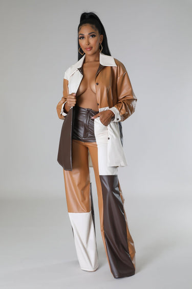 Back view of wide leg faux leather cargo pants – cargo pockets and straight leg silhouette