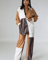 Side view of wide leg faux leather cargo pants – full length and relaxed fit