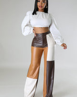 Side view of wide leg faux leather cargo pants – full length and relaxed fit