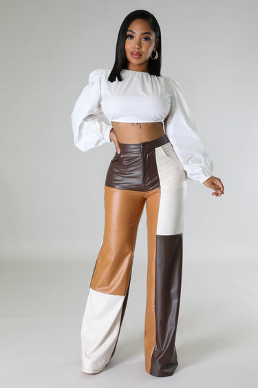 Side view of wide leg faux leather cargo pants – full length and relaxed fit