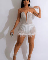 Elegant White elegant mini dress on model styled for going out