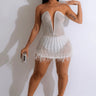 Elegant White elegant mini dress on model styled for going out