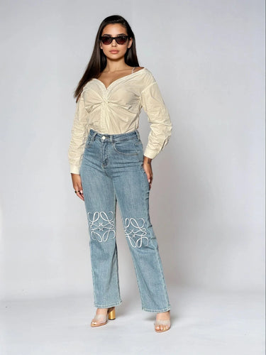 High-Rise Straight Leg Jeans with Embroidered Knee Detail front view showing jeans fit and silhouette