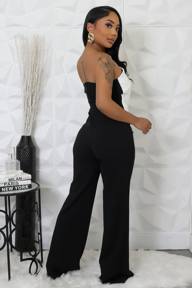 Side view of wide leg jumpsuit black – straight silhouette and leg length