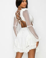 Honey Comb Mesh Mini Dress with Long Sleeves and Side Cutouts side view highlighting short hemline