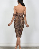 Elegant The Shoulder Print ruched midi dress on model styled for evening
