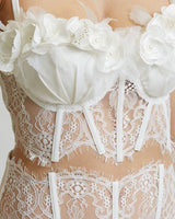 Romantic white pant set featuring boning and padded bustier