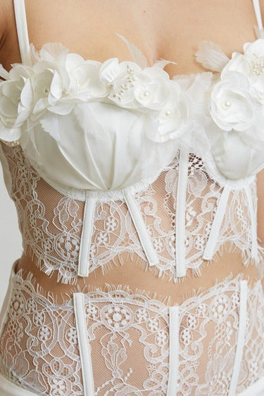 Romantic white pant set featuring boning and padded bustier