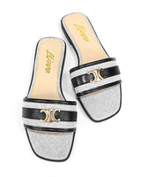 Black flat sandals with gold insole detail – summer footwear by Joey