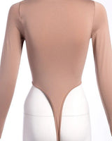 Lara High Crotch Mockneck Bodysuit (Nude) close up of fitted fabric and design detail