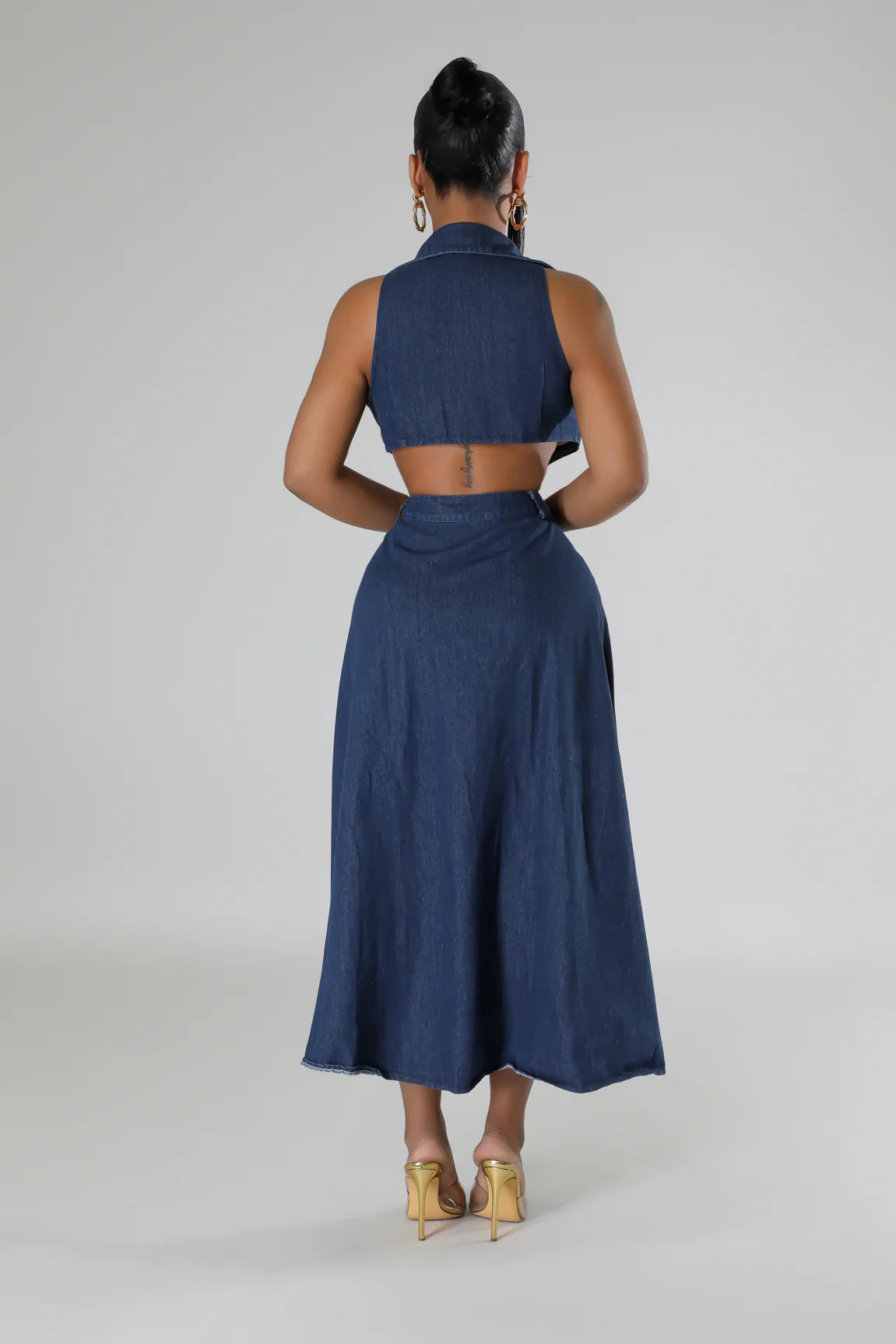  denim maxi dress featuring a backless design and sleeveless cut