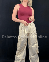 Beige luminous cargo pants with utility pockets