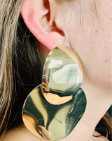 Abstract gold statement earrings with metallic finish