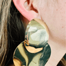 Abstract gold statement earrings with metallic finish