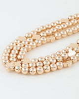 Luxe Clove Beaded Choker Necklace - a sophisticated piece with luminous beads and clove-shaped accents.