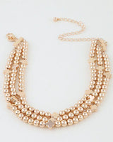 Elevate your neckline with the Luxe Clove Beaded Choker Necklace for a refined sparkle and confident finish
