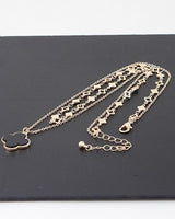Double-layer clover necklace in gold and black finish
