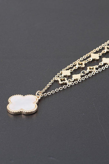 Gold cream clover necklace with layered chain design